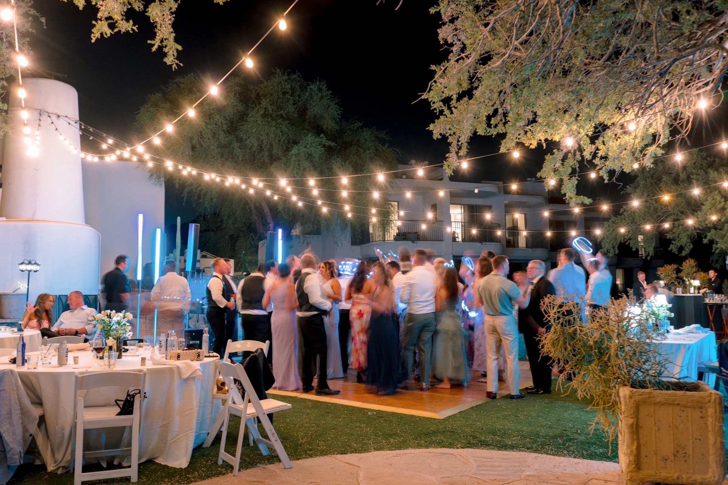Night wedding reception under string lights at Adero Scottsdale Resort
