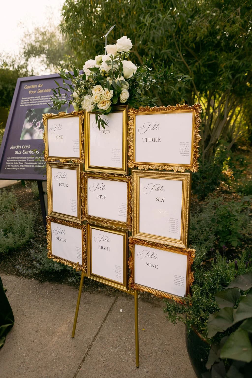 Gilded frame seating chart display at a Desert Botanical Garden wedding