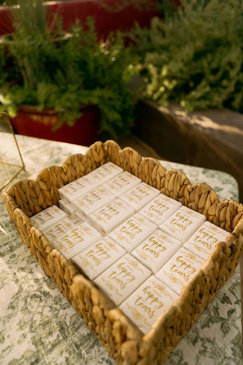Wedding favors displayed in a woven tray at Desert Botanical Garden