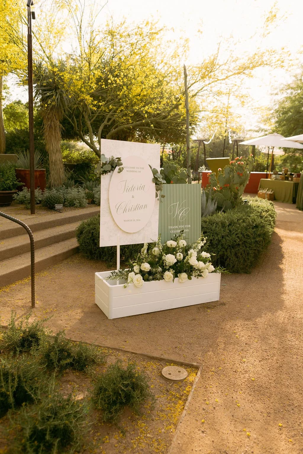 Wedding welcome sign with white florals at Desert Botanical Garden