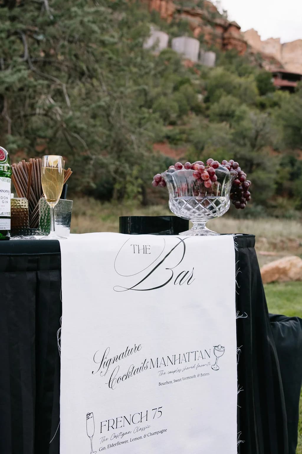 Signature cocktail bar signage against the canyon at Enchantment Resort
