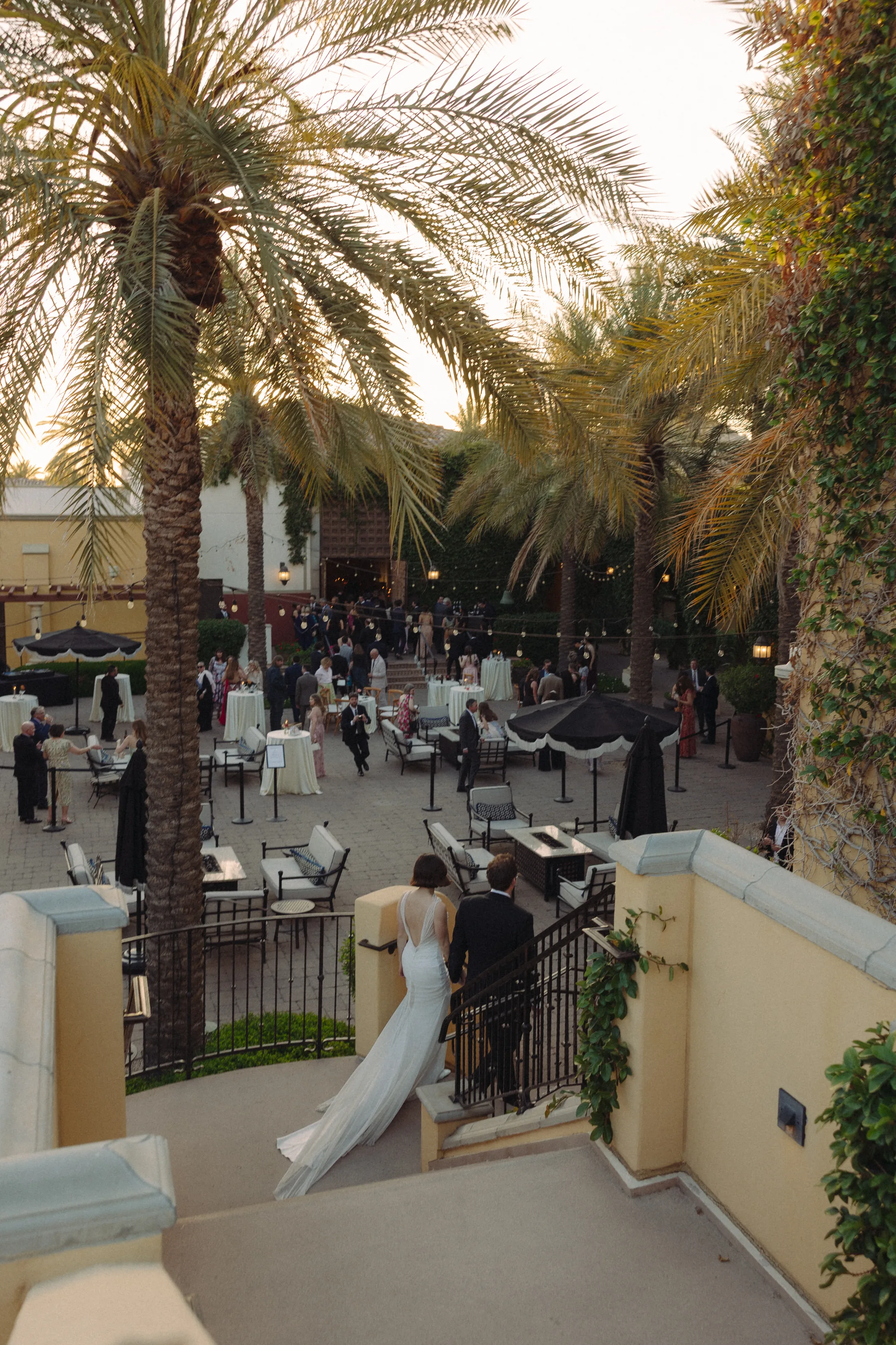 Palm-lined courtyard wedding reception at Omni Scottsdale Resort & Spa at Montelucia