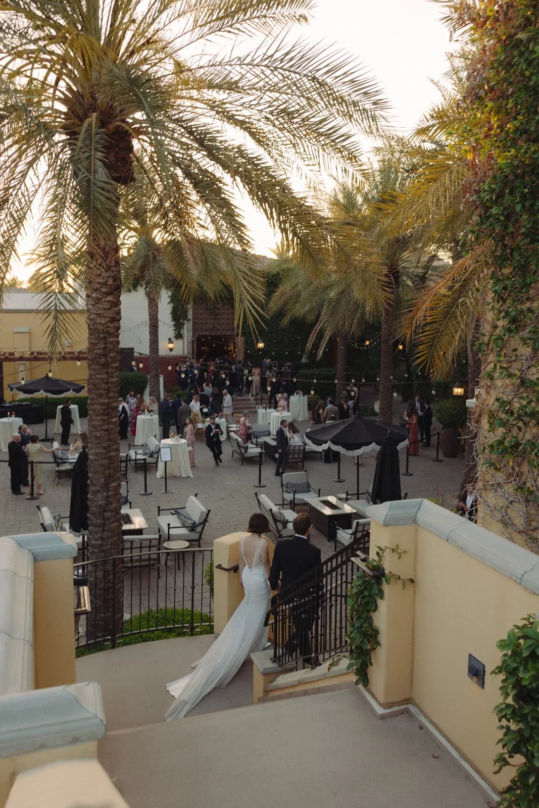 Palm-lined courtyard wedding reception at Omni Scottsdale Resort & Spa