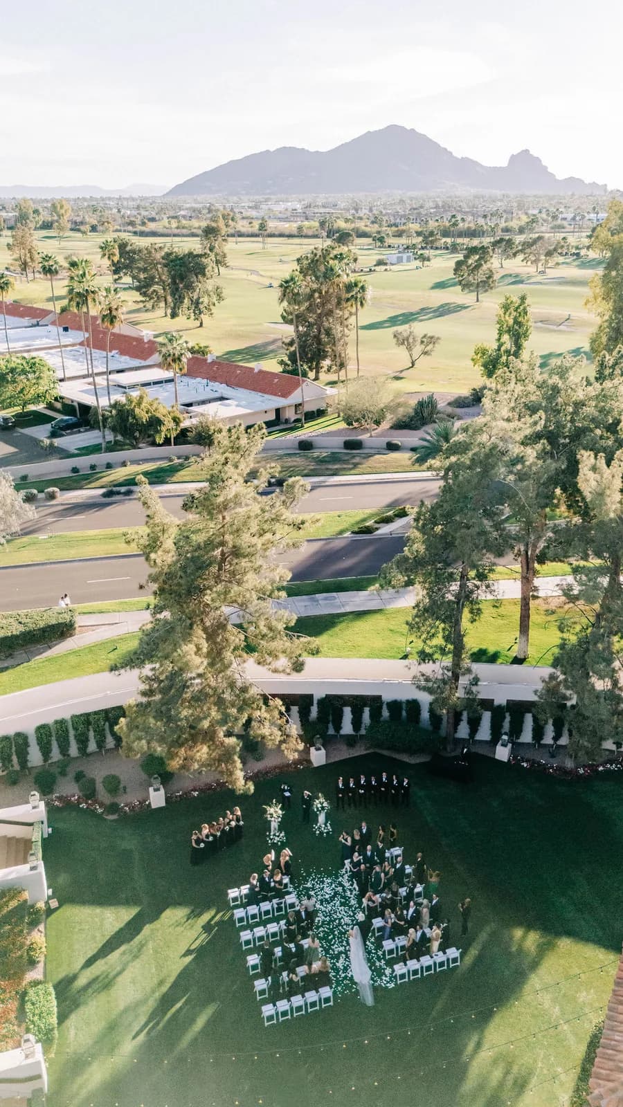 Aerial view of The Scottsdale Resort grounds with Camelback Mountain beyond